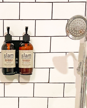 Siam Botanicals Shampoo and Conditioner dispenser with tiled background